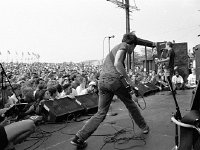 Fugazi  Onstage at an outdoor concert.